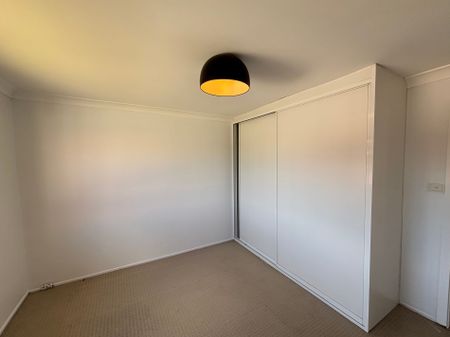 FRESHLY UPDATED 3-BEDROOM HOME WITH ENTERTAINING DECK - Photo 3