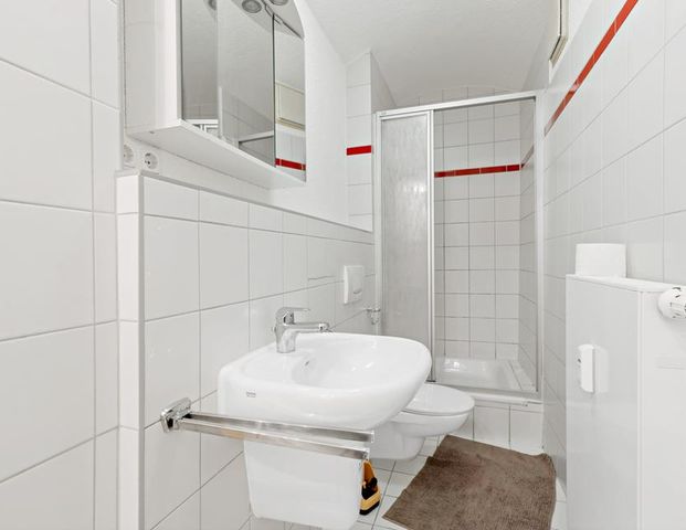 Charmante 2-Raumwohnung mit Einbauküche am Kirchtor! - Photo 1