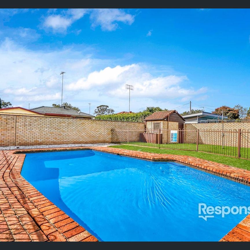 Family Home with Pool Opposite Reserve – Walk to York Public School! - Photo 1