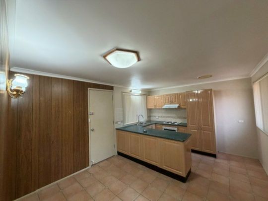 Three Bedroom Home with Ducted Air Conditioning and Double Garage - Photo 1