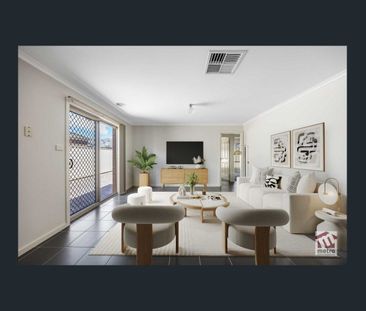 FAMILY LIVING WITH TWO SEPERATE LIVING AREAS! - Photo 1