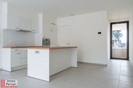 Gelijkvloers nieuwbouwappartement met 2 slaapkamers met terras en tuintje - Photo 2