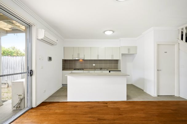 Good Size Townhouse With Fresh Updates Throughout! - Photo 1