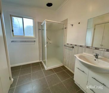 Charming Four Bedroom Home in Prime Location - Photo 6