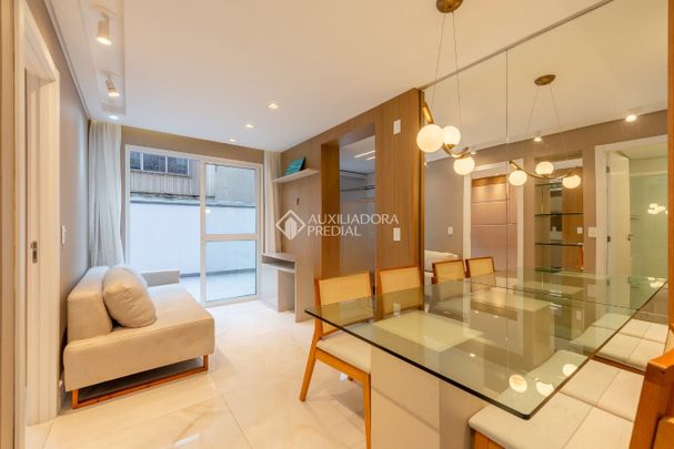 Apartamento Garden com 1 quarto e 60m² para alugar em Rio Branco, Porto Alegre. - Photo 1