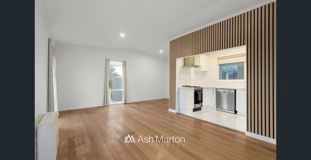 Three Bedroom Home in Prime Location - Photo 1