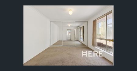 Street-Front Villa with Easy Living & Low Maintenance Appeal - Photo 5