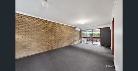 Ideal Location with Spacious Comfort and Convenient Living - Photo 2