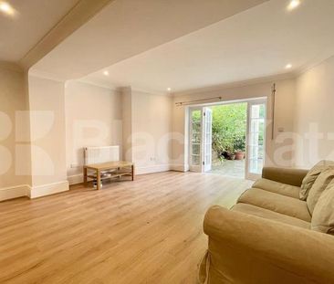 Spread over the ground floor of this stunning period building - Photo 1