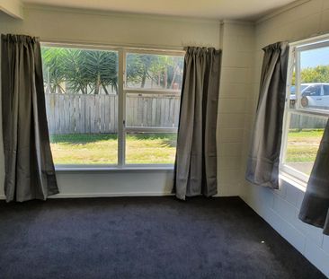 Tidy two bedroom unit with open plan kitchen, lounge and dining. - Photo 6