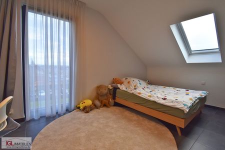 Triplex nieuwbouwappartement met 4 slaapkamers en garage - Photo 2