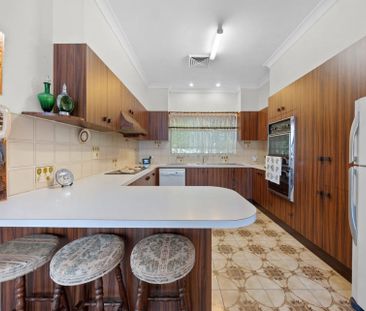 Spacious, Freshly Painted Family Home in a Prime Prairiewood Location - Photo 6