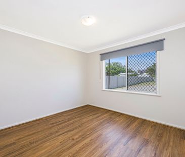 Neat & Tidy Home with Workshop and Side Access - Photo 4