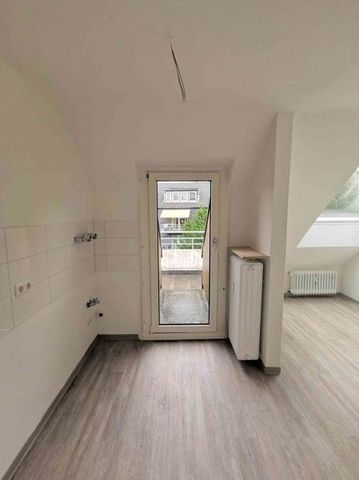 Hübsche 3-Zi.-DG-Whg. mit Balkon und 2 Bädern - Foto 3