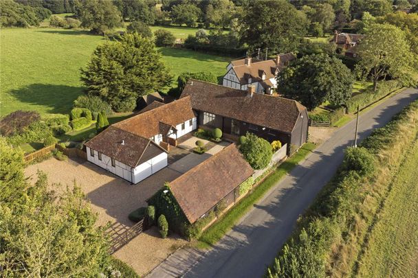 An impressive country home in a superb setting. Offering an abundance of character features , space and a fantastic garden with its very own helipad and hangar. - Photo 1