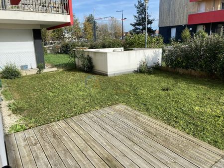 F 3 avec jardinet - Photo 2