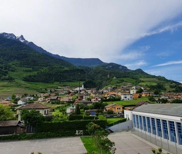 4.5 pces spacieux avec balcon et place de parc près de l'école - Photo 2