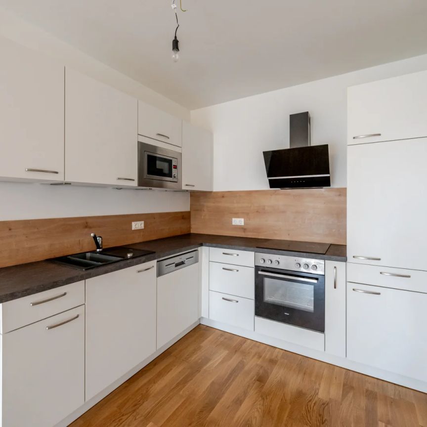 Ihr Rückzugsort im Grünen – 2-Zimmer-Wohnung mit Balkon und Tiefgaragenparkplatz - Foto 1