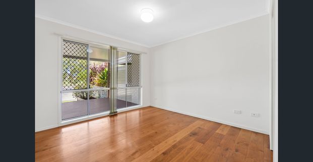 Dual-Level Living Overlooking Parklands - Photo 1