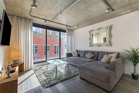 Furnished Four Double Bedroom townhouse with a garage and roof terrace on the centrally located Southern Street. - Photo 3