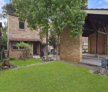 Centrally Located Three-Bedroom Townhouse - Photo 2