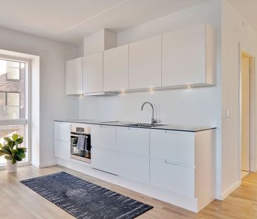 Rummelig og lys 4-værelses lejlighed med altan i et moderne byggeri... - Photo 4