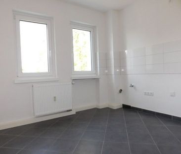 Bezugsfertige 3-Zimmer-Wohnung im Erdgeschoss mit Balkon und Lamina... - Photo 3