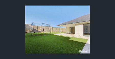 Live Comfortably: 4BR, 2 Bath Home with Garage in Sought-After Neighborhood! - Photo 3