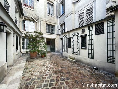 Logement à Paris, Location meublée - Photo 2