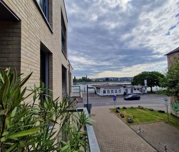 Schicke Citywohnung mit Balkon und seitl. Rheinblick sowie TG-Stellplatz - Photo 1