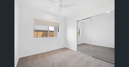 Experience Modern Living in a Brand-New Four-Bedroom Home! - Photo 4