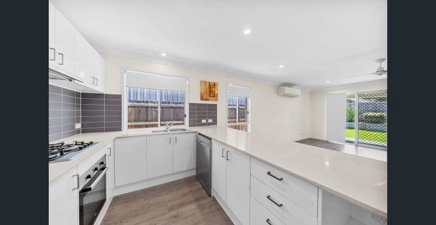 Spacious Modern Family Home in the Heart of Yarrabilba - Photo 1