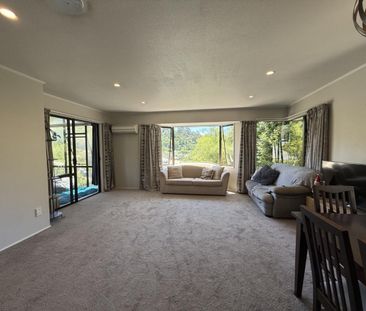 Modern Three-Bedroom Home with Sunroom and Stunning Views - Photo 1
