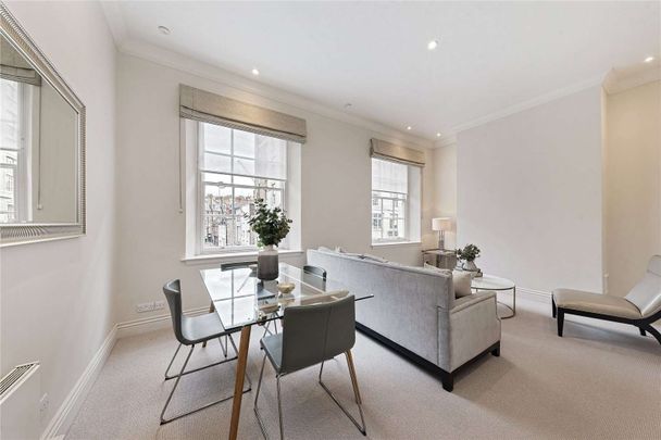 A modern two bedroom apartment situated on the first floor of a period building. - Photo 1