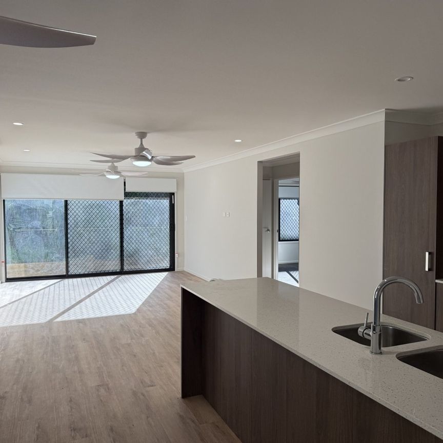 Brand New Family Home with Self-Contained Attached Unit - Photo 1