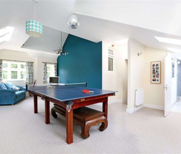 A superb family home offering flexible accommodation of four/five bedrooms with garage, garden and off street parking. - Photo 1