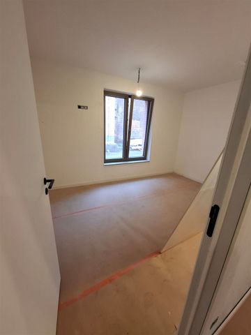 Nieuwbouw gelijkvloers appartement met 1 saapkamer - Photo 2