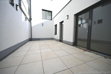 ERSTBEZUG: moderne Erdgeschoßwohnung mit kleinem Garten- 2 Bäder - Foto 2