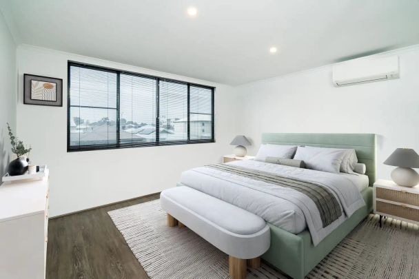 “SOPHISTICATED LOFT-STYLE TOWNHOUSE IN THE HEART OF SUCCESS” - Photo 1