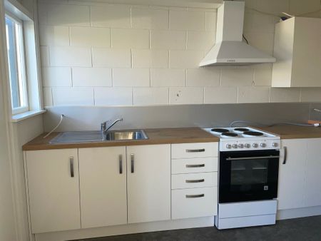 Tidy Unit Close to Town - Photo 4