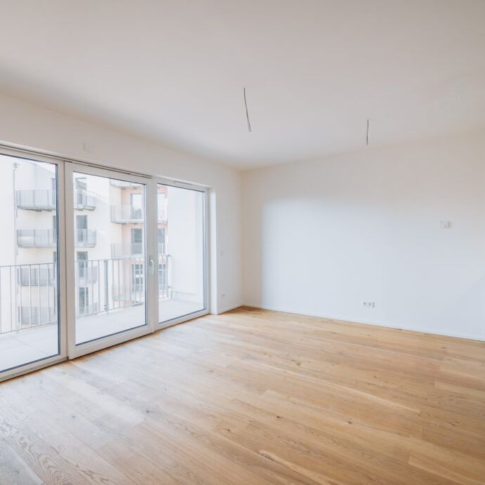 Neubaukomfort: Stilvolle 1-Zimmer-Wohnung mit Einbauküche und Balkon - Photo 1