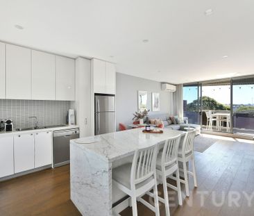 Elevated Luxury with Soaring Ceilings & Water Views - Photo 3