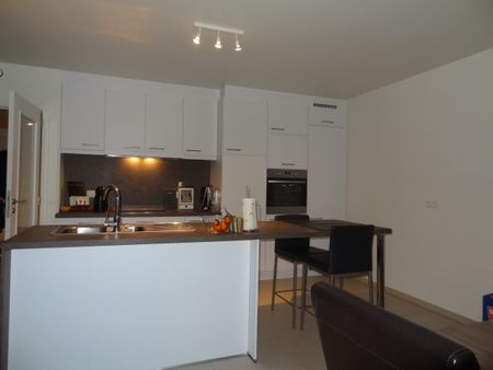 Appartement met 2 slaapkamers en tuin - Photo 2