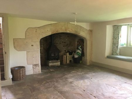 An imposing five-bedroom detached farmhouse on the edge of Neston village, blending original character with modern comforts, set within a large garden and offer - Photo 2