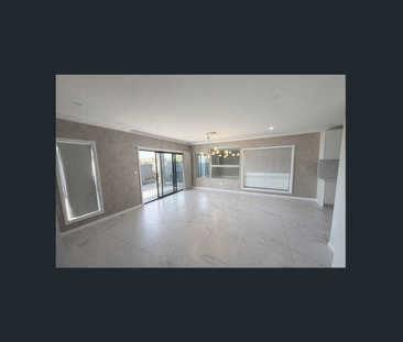 Contemporary 4-Bedroom Home in Prime Gregory Hills Location - Photo 5