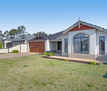 “Stunning Family Home” - Photo 1