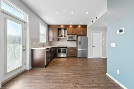 Quiet & Contemporary 3 Bed Townhouse | Close To Cross Iron Mall. Garage & A/C Included - Photo 2