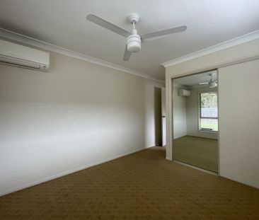 Modern 3 Bedroom Home with Spacious Yard - Photo 3