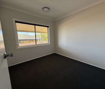 Renovated 2-Bedroom Haven - Photo 2