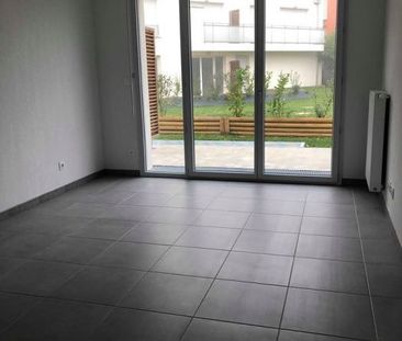 T2 AVEC TERRASSE+JARDIN+PARKING - Photo 1